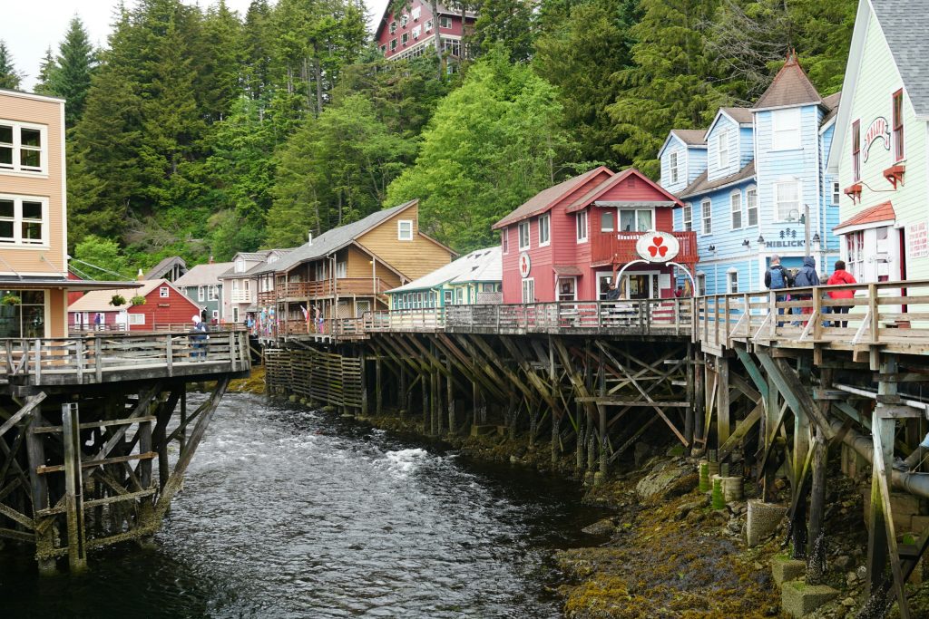Colorful historic buildings on pilings along Ketchikan Creek on Creek Street in Ketchikan, Alaska